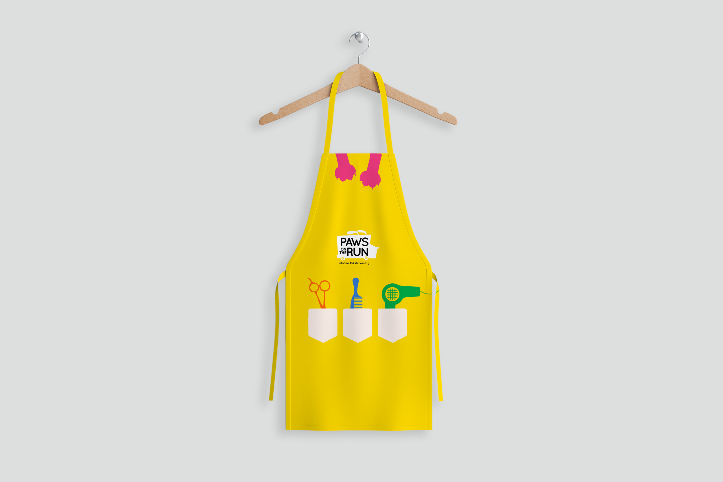 Paws On The Run apron design with paw prints across the chest