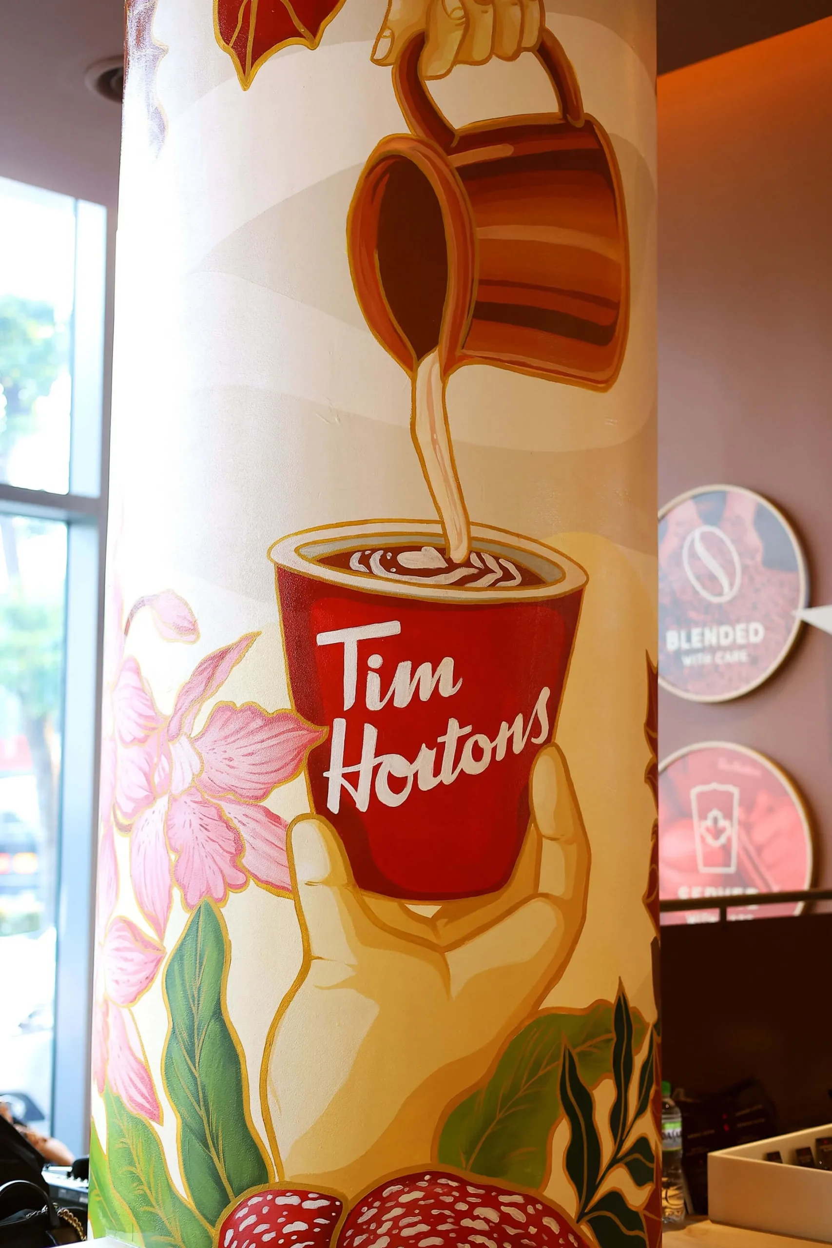 Lakar By Mekar mural at Tim Hortons Malaysia — Canada-meets-Malaysia coffeehouse theme