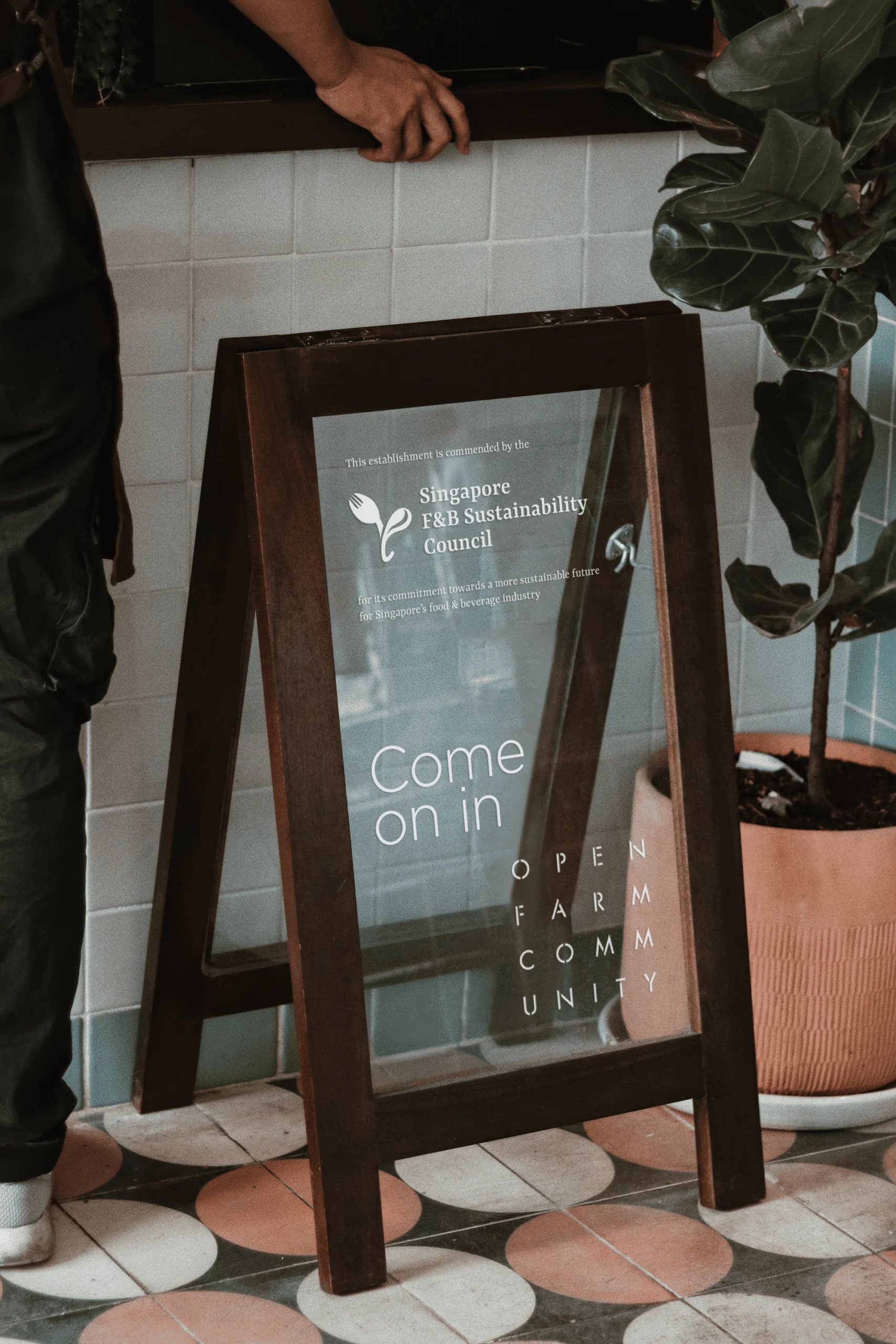 Singapore Food & Beverage Sustainability Council — brand mark on a glass board