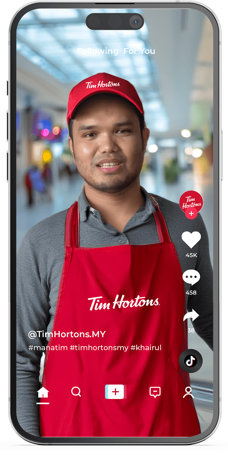 A TikTok mockup showing the proposed 'Tim' persona — Khairul Aming wearing a Tim Hortons cap and apron